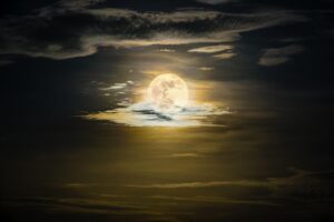 Full moon on the golden sky at night